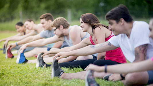 Athletes stretching feet